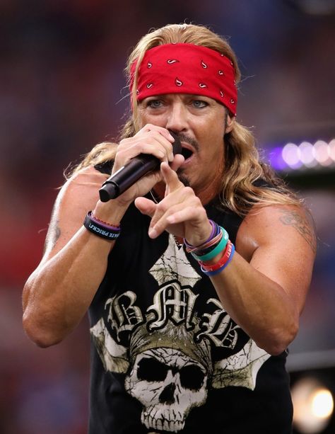 ROCKER Bret Michaels is making headlines as he has been hospitalized. On June 30, 2022, it was revealed that Bret Michaels and the band Poison had to cancel their show due to his hospitalization. Who is Bret Michaels? Bret Michaels is a singer, musician, and TV personality. The 59-year-old rocker is known as the frontman […] Bret Michaels Band, Bret Michaels Poison, Bret Michaels, 80s Hair, Airport Photos, Tv Personality, June 30, Photo Magnets, Sound Of Music