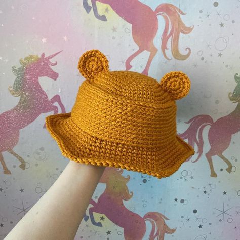 Yellow Crochet Accessories, Yellow Crochet Bucket Hat, Baby Bucket Hat Crochet, Bear Bucket Hat Crochet, Crochet Baby Bucket Hat, Yellow Crochet Projects, Frog Bucket Hat Crochet, Yellow Crochet Hat, Mustard Yellow Crochet