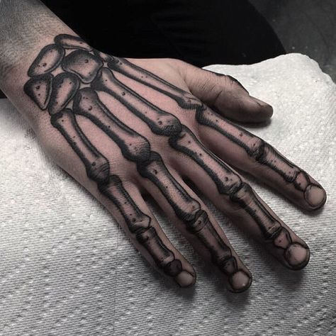 Skeleton Hand Tattoo | Tattoo Ideas and Inspiration Dark And Creepy Tattoos, Skeleton Face Hand Tattoos, Creepy Hand Tattoo Design, Hand Tattoos Creepy, Creepy Skeleton Tattoo, Black And Grey Skeleton Tattoo, 88 Tattoo, Skeleton Finger, Small Wave Tattoo