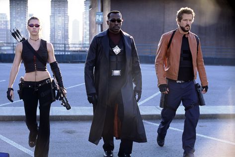 "Blade: Trinity" movie still, 2005.  L to R: Jessica Biel, Wesley Snipes, Ryan Reynolds.  PLOT: Blade (Snipes) teams up with a pair of vampire hunters (Biel, Reynolds) for a battle with the one and only Dracula.  During the making of this movie, Reynolds talked to director David S. Goyer who was adapting a Marvel Comic book for the big screen.  Ryan said he was interested in portraying a super hero. Blade Trinity, Blade Film, Police Font, X-men Wallpaper, X Men Funny, Blade Movie, Blade Marvel, Parker Posey, Film Marvel