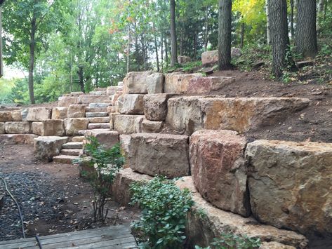 Retaining Wall Boulders, Boulder Walls Retaining, Boulder Entryway, Large Boulder Retaining Wall, Boulder Retaining Wall Ideas Hillside, Sunken Driveway, Rocks Pathway, Rock Retaining Wall Ideas, Lodge Landscaping