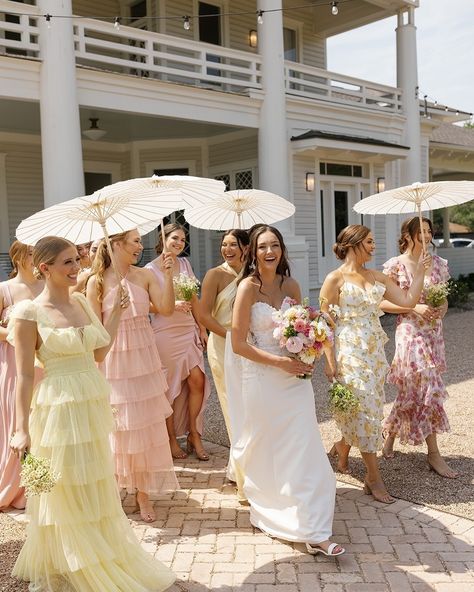 this heat has us reminiscing on last summers weddings ☀️ TIPS FOR SUMMER WEDDINGS 1. Provide as much shade as possible. Whether that is renting large umbrellas, purchasing cute parasol umbrellas (pictured above) or positioning your ceremony under the shaded tree area. 2. Plenty of ice water, and have more ice than you think you need. Have it accessible pre ceremony, cocktail hour, all day! 3. Purchase handheld electric fans, consider paper fans and renting industrial cooler fans for any ... Loveshackfancy Wedding, Yellow Floral Bridesmaid Dresses, Yellow Floral Bridesmaid, Wedding Ideas 2024, Pastel Bridesmaids, Parasol Wedding, Pastel Bridesmaid Dresses, Floral Bridesmaid Dresses, Garden Theme Wedding