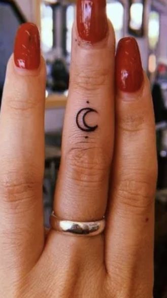 Finger Tattoo Witch, Tiny Witch Tattoo Finger, Finger Tats For Women Simple, Moon Sun Finger Tattoo, Small Moon Finger Tattoo, Cute Knuckle Tattoos, Womans Finger Tattoos, Half Moon Finger Tattoo, Moon On Finger Tattoo