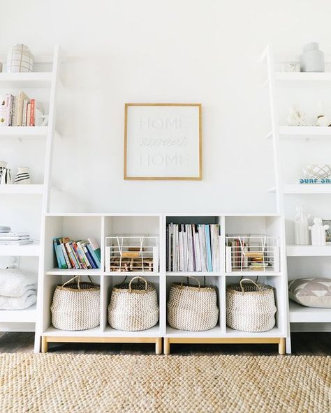 work well (and look good, too). In the case of your little one's room, you may only need a couple of shelves. But that doesn't mean a basic floating shelf will do — oh no! Only the best for your kids. Enter: this curvilinear design, which takes displaying knickknacks to the next level. Get the look: Rafa Kids XL Shelf, $550 Neutral Storage Bins, Playroom Baskets, Toy Basket Storage, Toy Room Storage, Living Room Toy Storage, Ikea Trofast Storage, Trofast Ikea, Toy Storage Ideas, Homeschool Space