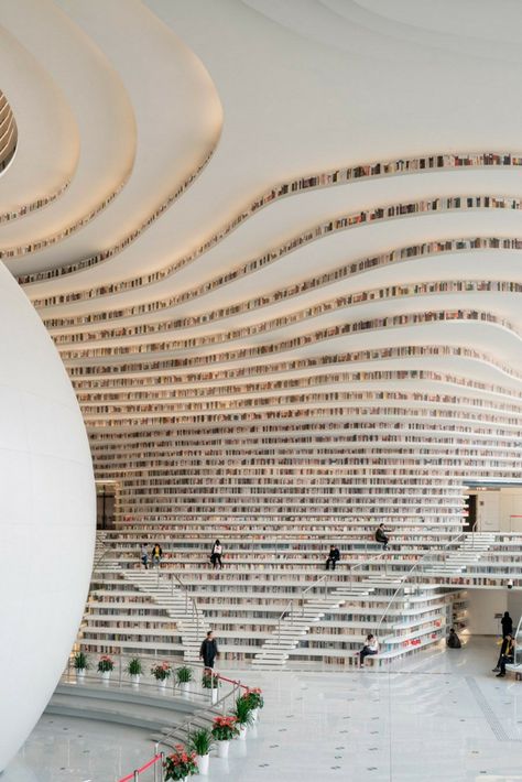 Be inspired!   Imagine reading your favourite book in this library! Tianjin Binhai , China. Project by @MVRDV studio which has been declared one of the most beautiful libraries in the world, 33,700m² built in just 3 years.  #library #tianjinbinhai #china #KerabenGrupo #biblioteca #arquitectura #architecture #books #modernarchitecture #design Topography Interior Design, Organic Library Design, China Library, Tianjin Binhai Library, Japanese Library, Futuristic Library, Library Room Design, Most Beautiful Libraries, Book Architecture