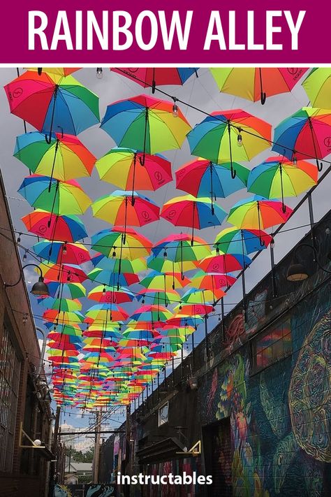 Suspend a collection of rainbow umbrellas in an alley setting to create shade and a beautiful art piece. #Instructables #outdoors #decor #pride Pride Photo Backdrop, Pride Festival Decorations, Pride Decorations Ideas, Pride Event Ideas, Festival Decorations Outdoor, Pride Picnic, Pride Decorations, Diy Umbrella, Pride Decor