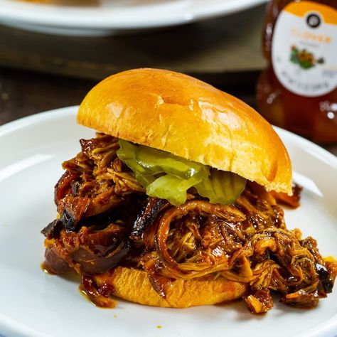 Slow Cooker Hot Honey Chicken- a sweet and spicy shredded chicken that makes a great sandwich. The chicken is wonderfully juicy. Calibrate Recipes, Spicy Shredded Chicken, Hot Honey Chicken, Spicy Southern Kitchen, Chicken Crockpot, Southern Kitchen, Hot Honey, Crockpot Dishes, Honey Chicken