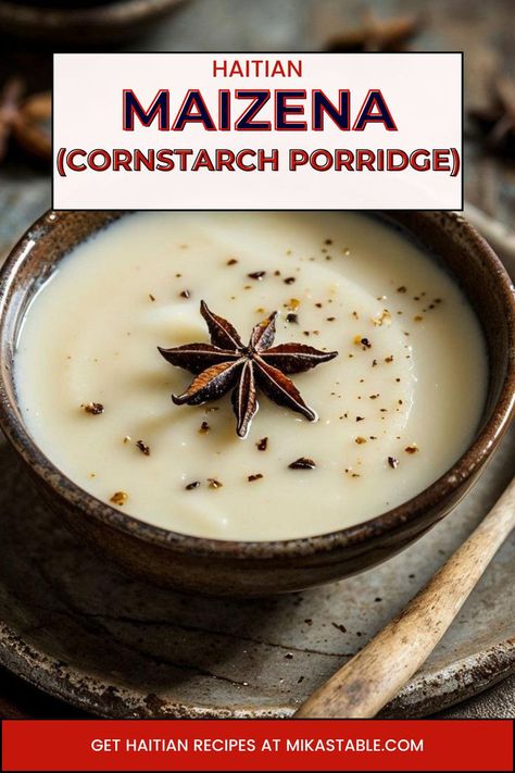 A creamy bowl of Haitian Maizena (Cornstarch Porridge) garnished with a star anise and a sprinkle of spices, served on a rustic ceramic plate with a wooden spoon beside it. The pin promotes the authentic and comforting dish, highlighting its simplicity and rich flavors. The text directs viewers to Mika's Table for more Haitian recipes. Haitian Porridge, Haitian Hot Chocolate Recipe, Maizena Recipe, Soup Joumou, Cold Breakfast, Haitian Recipes, Porridge Recipes, Haitian Food Recipes, Hot Chocolate Recipes