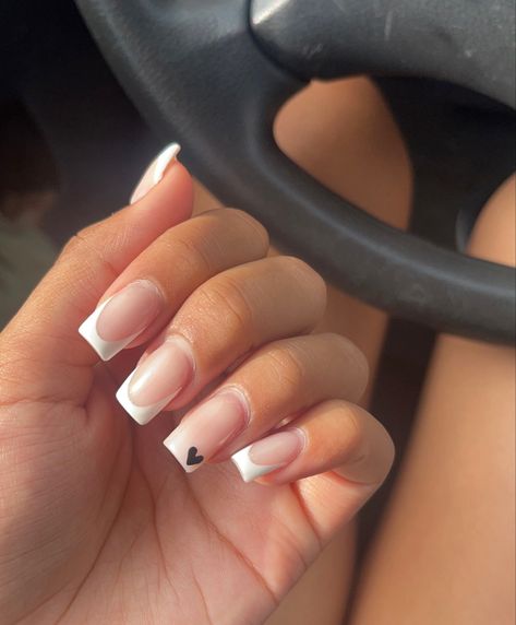 White french tip, classic french tip, classy nails, elegant nails, clean girl aesthetic nails, minimalistic nails, black heart accent nail, black heart nails, nails 2023 Black French Tips With Accent Nail, White French Tip Black Heart, White French Tip Nails With Black Design, White Nails With Black Accent, White French Tip With Black Design, Tuxedo French Tip Nails, White Tips With Heart, Black And White French Tip Nails Square, French Tip Nails With Accent Nail