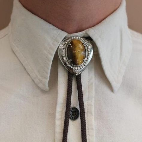 Skull Bolo Tie, How To Wear A Bolo Tie Men, Western Bolo Ties Men, Bolo Tie Men Outfit, Bolo Tie Aesthetic, Bolo Tie Groom, Bolo Tie Outfit, Bolo Tie Women, Bolo Tie Wedding