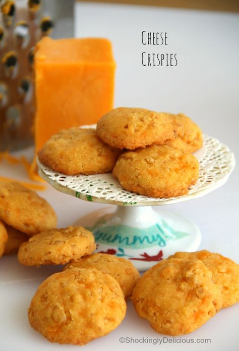 Cheese Crispies are a cheesylicious savory cookie-cracker perfect as an hors d’oeuvre or at a cocktail party or tea or a snack. The Rice Krispies give a secret crunch. #shockinglydelicious #cheesecrackers #cheesecookies #cheesenibbles Party Rice, Crackers Appetizers, Savory Cheese, Wisconsin Cheese, Queso Cheddar, Cracker Recipes, Cheese Crackers, Party Food Appetizers, Savory Snacks