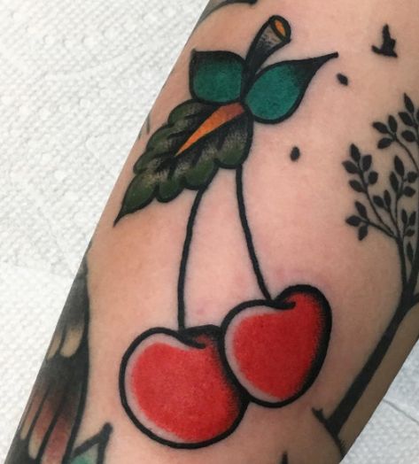 CafeMom.com : Red cherries : 50 Bold Traditional Style Tattoos -- These red cherries are so cute and fun! They pack a bright punch of color onto anyone's skin. Traditional Style Tattoos, Tattoo Calf, Cherry Tattoo, Tato Tradisional, Cherry Tattoos, Traditional Style Tattoo, Traditional Sleeve, Tattoos Mandala, Traditional Tattoo Sleeve