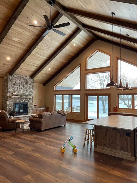 We love how these customers utilized our hardwood shiplap on their lake home ceiling! Beautiful! Lighting In A Vaulted Ceiling, Peaked Ceiling Lighting, Wood Stain Ceiling Living Rooms, Rustic Wooden Ceiling, Cabin Ceiling Ideas Wood Planks, Cedar Ceilings Living Room, Raw Wood Ceiling, Cathedral Ceiling Shiplap, Light Wood Ceiling Living Room