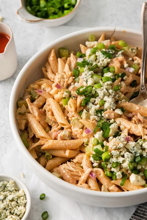 With this easy buffalo chicken pasta salad, you'll get all the spicy, tangy flavors of the beloved sauce but in a deliciously creamy pasta salad that is seriously delish. Beloved Sauce, Buffalo Pasta, Creamy Pasta Salad, Chicken Macaroni Salad, Buffalo Chicken Pasta Salad, Cheesy Pasta Recipes, Buffalo Ranch Chicken, Cashew Chicken Recipe, Chicken Ranch Pasta