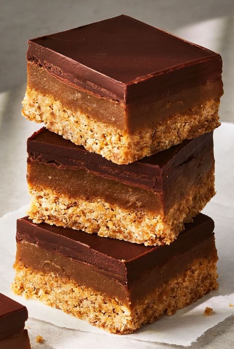 In this Tamarind Millionaire's Shortbread recipe, layers of rich chocolate, sweet and tangy tamarind-spiked caramel, and a buttery crust make up this simple but decadent dessert recipe meets cookie recipe. #dessertrecipes #dessertideas #dessertdishes #sweettreats Homemade Cookies Recipes, Buttercream Sugar Cookies, Tamarind Recipes, Millionaire's Shortbread, Salty Desserts, Fudge Caramel, Scottish Shortbread, Millionaire Shortbread, Shortbread Recipe