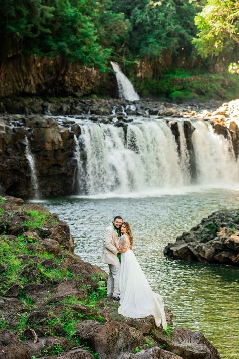 Are you exploring Hawaii waterfall wedding options on Hawaii Big Island? An exciting and gorgeous option for you to consider is the Falls At Reed's in Hilo, Hawaii. This private venue with an onsite Airbnb might be the perfect location for your Hawaii waterfall wedding. The Falls at Reed's Island has been selected one of the 12 best places for a destination wedding venues in Hawaii. All Inclusive Wedding Package Kona Wedding Officiant® , Photographer Photographers In Hawaii Hawaii Mountain Wedding, Elopement In Hawaii, Hawaii Mountains, Hawaii Mountain Elopement, Kona Wedding, Hawaii Waterfalls, Small Hawaii Wedding Oahu, Hawaii Cliff Wedding, Elopement Hawaii