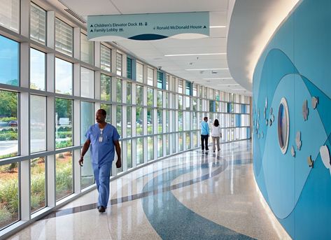 James and Connie Maynard Children's Hospital at the Vidant Medical Center in Greenville, NC. Photography courtesy of HDR Architecture, Inc. Hospital Lighting, Hospital Hallway, Blue Hospital, Children Hospital Design, Pediatric Hospital, Hospital Design Architecture, Healthcare Interior Design, Medical Office Design, Hospital Architecture