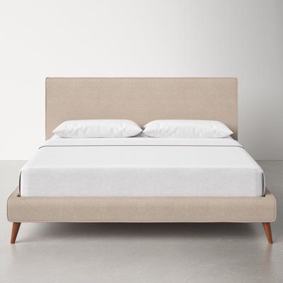 Our never-goes-out-of-style mid-century modern icon. Clean lines + flared cone legs give this platform bed an assertive look inspired by retro designs. It’s built to last from kiln-dried wood with durable dovetail joinery, and fully wrapped in plush cushioned fabric. An included slat kit supports you + your mattress – no box spring required. Size: California King, Color: Light Gray Basketweave AllModern Williams Upholstered Low Profile Platform Bed in Gray | Size 48.0 H x 81.0 W x 93.0 D in Contemporary King Bed, Wood And Upholstered Bed, Platform Bed Upholstered, Low Profile Platform Bed, Sofa Review, Contemporary Bed, Upholstered Bed, Platform Bed Frame, Upholstered Platform Bed