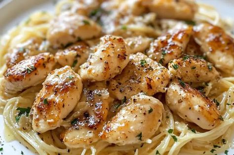 Indulge in a taste of Italy with this Chicken Scampi, featuring tender chicken cooked to perfection and served over a bed of angel hair pasta. The dish is bathed in a flavorful garlic-lemon butter sauce with hints of dry white wine, making each bite refreshing yet comforting. It’s the perfect recipe to elevate your everyday dinners or impress guests with its vibrant flavors and elegant presentation. Ready in just 30 minutes, this chicken scampi recipe is all about simplicity and great taste. ... Grilled Chicken Scampi, Angel Hair Pasta Recipes Chicken, Chicken Scampi Pasta, Chicken Scampi Recipe, Chicken Scampi, Everyday Dinners, Scampi Recipe, Elegant Presentation, Light Salad