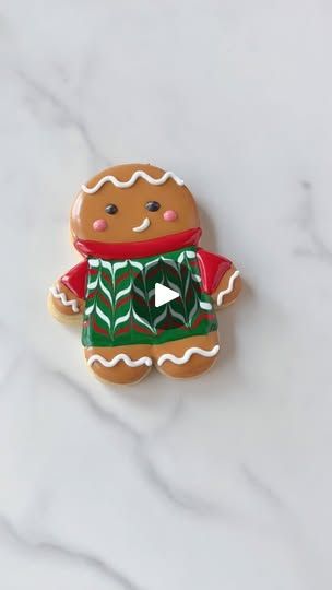 31K views · 3.8K reactions | Gingerbread season is in full swing! ✨ 

I absolutely loved decorating this gingerbread cookie with a cozy sweater using the wet-on-wet technique—it’s such a fun and creative way to add beautiful details! This little guy turned out so adorable, he might just be one of my favorites 🥹💕.

What do you think? Isn’t he the cutest? Let me know if you love this technique as much as I do! 

How does that feel? It focuses more on your love for the technique and the cookie itself.

#cookiedecorating #cookieart #gingerbread #christmas #wetonwet #oddlysatisfying | Laura Alvarez - Decorated cookies Wet On Wet Christmas Cookie Decorating, Easy Christmas Cake Recipe, Christmas Cookie Cake, Christmas Sugar Cookies Decorated, Christmas Cookie Decorating, Sugar Cookie Decorating, Cookies With Royal Icing, 50k Views, Christmas Cake Recipes