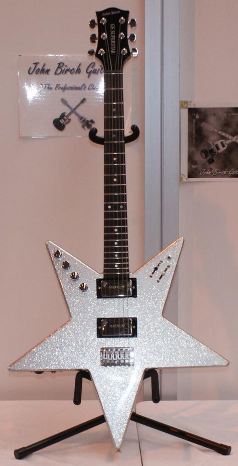 I remember seeing Marco Pirroni playing one of these in the Apollo 9 video. How cool!!! Star Shopping Guitar, Star Shape Guitar, Alt Guitar Aesthetic, Star Shaped Electric Guitar, Funky Electric Guitar, Instruments Art, Electric Guitar Design, Guitar Obsession, Unique Guitars