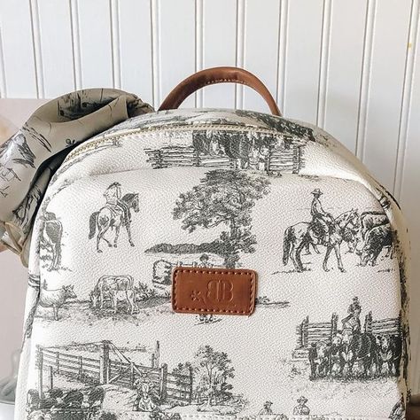 The Little Western Brand ™ on Instagram: "Mama’s don’t let your cowboys grow up to be babies 🖤 The diaper bag we’ve all been dreaming of 🤍 If you’re not in the market for a diaper bag, this backpack is also great for travel, used as a book bag, laptop carrier, etc. #westernstyle #westernbotique #westerndiaperbag #cowboynursery #cowgirlnursery #cowboydiaperbag #westernwear #westernfashion #cowkids #ranchkids #farmkids #rodeokids #cowboylife #cowboylifestyle" Baby Boy Diaper Bag, Western Diaper Bag, Western Baby Nurseries, Cowboy Nursery, Laptop Carrier, Cowgirl Nursery, Western Baby, Baby Wishlist, Baby Stuffed Animals