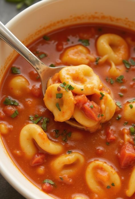 Slow Cooker Tomato Tortellini Soup Recipe

Ingredients

- 1 tablespoon olive oil
- 1 medium onion, diced
- 2 cloves garlic, minced
- 1 can (28 ounces) crushed tomatoes
- 4 cups vegetable broth
- 1 teaspoon dried basil
- 1 teaspoon dried oregano
- 1/2 teaspoon salt
- 1/4 teaspoon black pepper
- 2 cups fresh spinach
- 1 package (9 ounces) refrigerated cheese tortellini
- Grated Parmesan cheese for serving

Full Cooking Instructions on... Tortellini Straw And Hay, Creamy Slow Cooker Spinach Tomato Sausage Tortellini Soup, Cheese Tortellini Soup Recipes, Slow Cooker Tomato Tortellini Soup, Tortilini Recipes Soups, Tomato Tortellini Soup Crockpot, Cheese Tortellini Recipes Crockpot, Tortellini Spinach Soup, Vegetarian Tortellini Soup