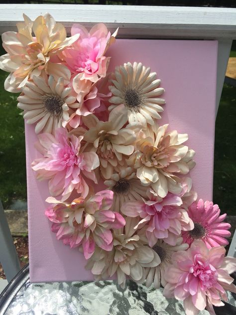 Super quick and easy project! It's just spray painted fake flowers from the dollar store glued to a canvas with a hot glue gun. I painted a few of the flowed on top of the spray paint with some acrylic paint, but that's totally optional. Enjoy! Hot Glue Flowers On Canvas, Fake Flowers On Canvas, Painting Canvas Easy, Bathroom Wall Decor Diy, Paper Flower Wall Art, Diy Canvas Art Easy, Candle Girl, Wall Decor Diy, Easy Flower