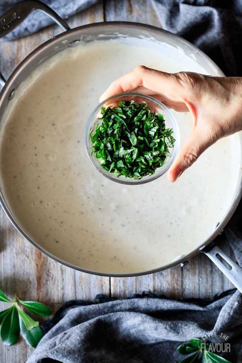 Alfredo basil sauce is an easy recipe that is creamy, cheesy, and so simple to learn how to make. With the help of some garlic, Parmesan, heavy cream, and fresh basil, you'll have a restaurant quality sauce that tastes amazing on fettuccine or tortellini. | www.savortheflavour.com #savortheflavour #alfredosauce #pastasauce Basil Alfredo Sauce, Alfredo Sauce Recipe Easy Heavy Cream, Basil Sauce Recipe, Fettuccine Sauce, Alfredo Sauce Recipe Without Heavy Cream, Fresh Basil Recipes, Roasted Grape Tomatoes, Alfredo Sauce Recipe Easy, Zesty Salad