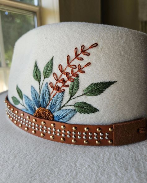 The finished hat! I'm super proud of this piece as I've always wanted to embroider this type of hat. My hand and fingers definitely took a meeting while embroidering this material, but I think it was worth it. I did finish one more hat before I left for my trip so I can't wait to show you that one too! What do you think? . . . . . . . . . #embroidereverything #embroiderersofinstagram #hats #fiberartist #floralart #loveflorals #miniatureembroideryartist Embroidered Felt Hat, Embroidery Hat Designs, Felt Hat Embroidery, Summer Wide Brim Embroidered Hats, Casual Wide Brim Embroidered Hats, Floral Hat Embroidery, Hat Embroidery Ideas, Casual Embroidered One-size Hats, Cowboy Hat Embroidery