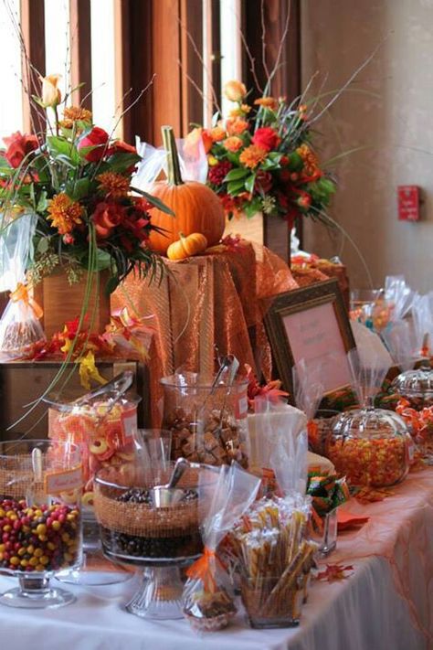 Fall candy favor table Fall Wedding Candy Table Ideas, Fall Candy Bar Wedding, Autumn Buffet Table Decor, Fall Wedding Candy Bar Ideas, Fall Candy Table Ideas, Halloween Wedding Candy Bar, Fall Wedding Gift Table, Bridal Shower Candy Favors, Halloween Wedding Favors