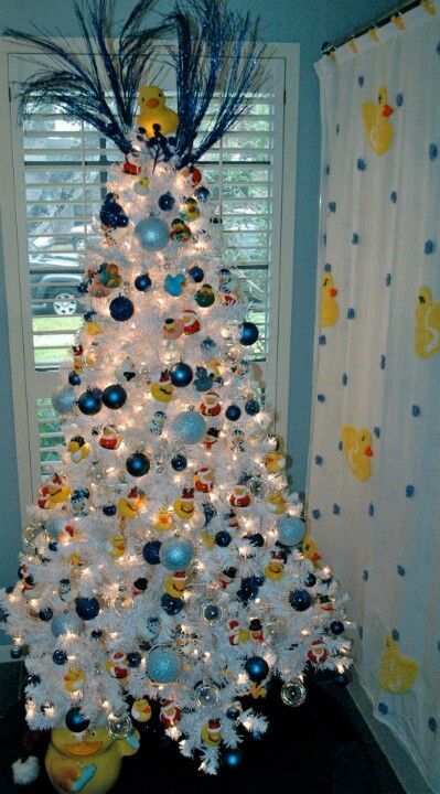 Awesome rubber ducky tree! #RhodeIslandBathroom Blue And Yellow Christmas, Duck Christmas Tree, Rubber Ducky Bathroom, Duck Christmas, Yellow Christmas, You're The One, Christmas Bathroom, White Tree, Rubber Ducky