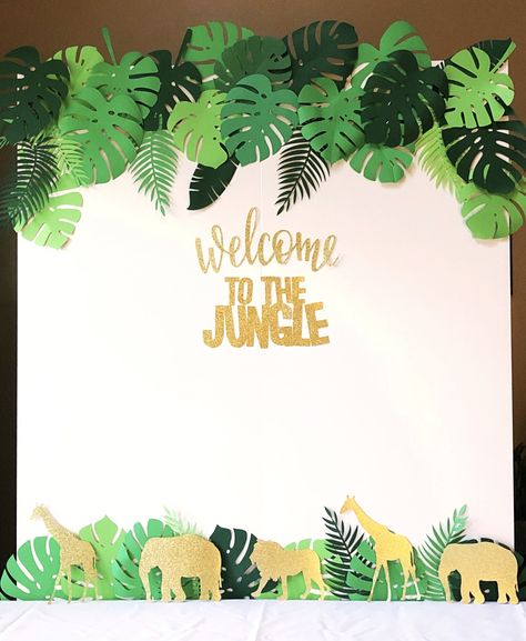 Paper Leaves and Animals for your Jungle Theme Party Wall Decor! A Fun Jungle Backdrop will brighten up any event. DIY with tropical paper leaves and your favorite glitter card stock jungle animals. #jamelloveandpaper #junglethemeparty #paperleaves #diy #animals Jungle Theme Wall Decor, Jungle Party Backdrop, Safari Backdrop Diy, Diy Jungle Leaves, Jungle Theme Decorations Backdrops, Jungle Backdrop Diy, Rainforest Birthday Party Ideas, Safari Theme Backdrop Ideas, Jungle Theme Birthday Party Diy