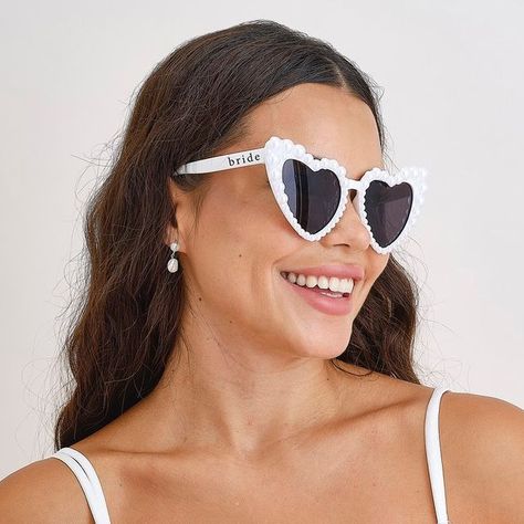 Online Party Shop - est.2012 | Favor Lane Shelley Sykes on Instagram: "🤍 Bride Goals 🤍 
Yes…these Pearl Embossed Bride sunglasses are perfect for not only bridal showers but also the wedding day!! 👰🕶️🤍 

Shop online at www.favorlane.com.au 

#bridetobe #pearlsunglasses #sunglassesstyle #bridesunglasses #bridestyle #perthbride #perthbridetobe #sydneybride #sydneybridetobe #melbournebride #melbournebridetobe #brisbanebridetobe #brisbanebride #weddingdecor #bridalshowerdecor #bridalshowerideas #henpartyideas #henpartyweekend #henpartyplanning #henparty" Bride Sunglasses, Pearl Ornaments, Pearl Bride, Heart Shaped Glasses, Heart Glasses, Heart Shaped Frame, Pearl Love, Pearl Decorations, Party Sunglasses