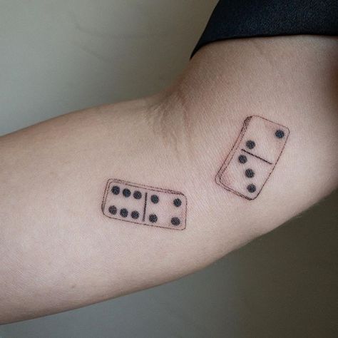 Falling dominoes 🤭thank you 4 this fun placement danielle 🖤 #handpokedtattoo Domino Butterfly Tattoo, Butterfly Effect Tattoo Dominos, Dainty Dice Tattoo, Domino Effect Tattoo, Gran Tattoo, Domino’s Tattoo, Domino Tattoo, Symbol For Family Tattoo, Simple Flower Tattoo