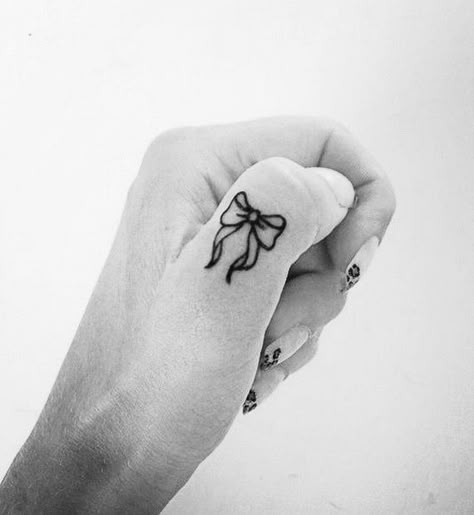 Chanel Tattoo, Bow Finger Tattoos, Wedding Band Tattoo, Finger Tattoo For Women, Hand And Finger Tattoos, Finger Tattoo Designs, Ribbon Tattoos, Best Tattoo Ideas, Bow Tattoo