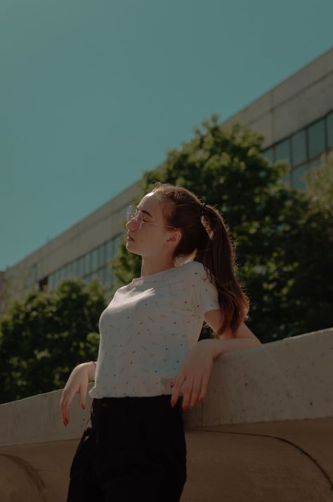 woman leaning on beige concrete rail while closing her eyes during daytime Leaning Against Railing Pose, Leaning On Railing, Beige Concrete, Single Poses, Women Best, Reference Poses, Style Women, Clothes Accessories, Railing