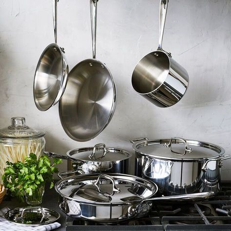 A useful assortment, the All-Clad Stainless 401488-R 10-piece cookware set includes 8 inch and 10 inch fry pans, a 3 quart covered Saute pan, 2 quart and 3 covered sauce pans, and an 8 quart covered stockpot. All-Clad’s Stainless 3-ply cookware features a thick-gauge aluminum core that attracts heat fast, while the addition of stainless steel ensures even heat distribution for consistent results across the entire cooking surface, all the way to the rim. Non Toxic Cookware, Best Cookware, Stainless Steel Pans, Cookware Set Stainless Steel, Copper Cookware, Stainless Steel Pot, Stainless Steel Cookware, Nonstick Cookware, Cute Kitchen