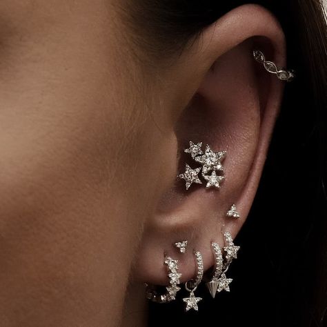 MARIA TASH on Instagram: “Come meet Dublin’s finest stylists and piercers. All of these inspiring curations come from our Brown Thomas location. Find us on the…” Conch Ear Piercing, Conch Piercing Stud, Inner Conch Piercing, Maria Tash Earrings, Helix Piercing Jewelry, Maria Tash, Multiple Ear Piercings, Star Garland, Three Star