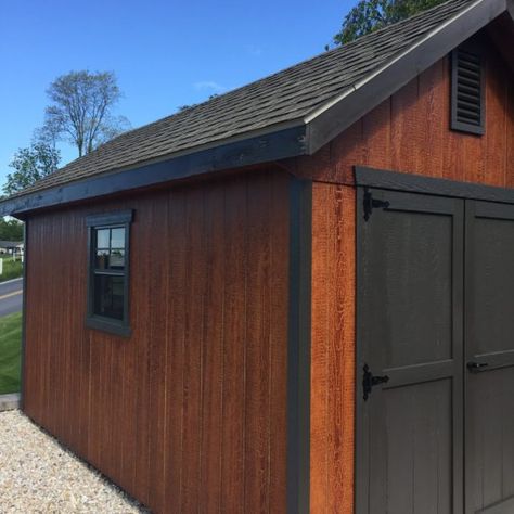 This storage shed is over 10 years old and it looks just as beautiful as they day it was coated!   There is no need to buy a new shed when the coating is starting to fade! Contact us at haleypaint.com to get your shed paint today!   #haleypaint #gardenshed #shed #sheds #recoating #garden Storage Shed Colors, Shed Stain Ideas, Storage Shed Paint Ideas, Brown Shed Ideas, Black Shed Ideas, Shed Colors Ideas Paint, Shed Painting Ideas, Cozy Garage, Painted Sheds