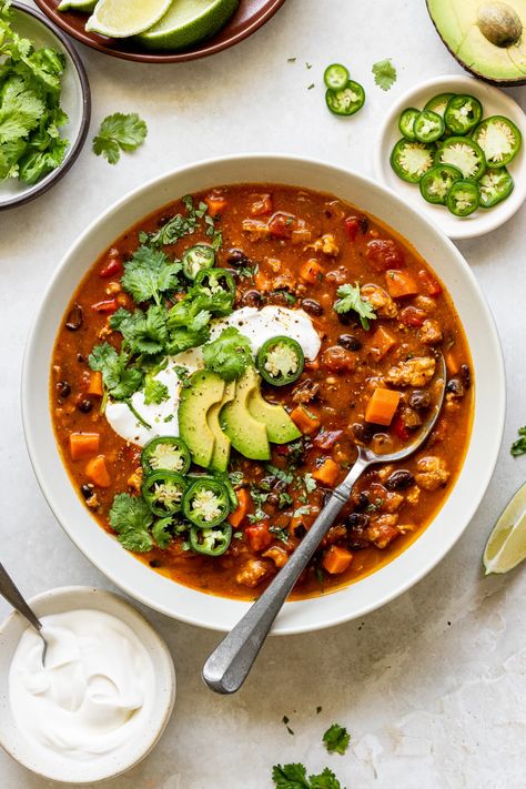 This One-Pot Turkey Pumpkin Chili is flavorful, simple to make, packed with veggies like carrots, bell pepper, tomatoes and (of course) pumpkin puree. Loaded with protein from ground turkey and black beans, this easy chili recipe is the perfect cozy dinner for a busy weeknight. Ground Turkey Recipes Chili, Turkey Quinoa Chili, Recipes With Pumpkin Puree, Chili With Black Beans, Recipes With Pumpkin, Natural Nurturer, Turkey Stew, Turkey Pumpkin Chili, Pumpkin Chili Recipe