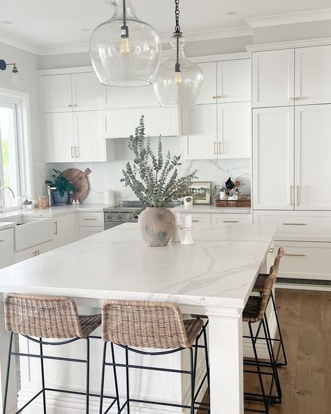 White Walls White Cabinets, White Stone Backsplash, Lights Over Kitchen Island, Warm Wood Flooring, Stainless Steel Stove, White Kitchen Island, Stone Backsplash, Light Wood Floors, All White Kitchen