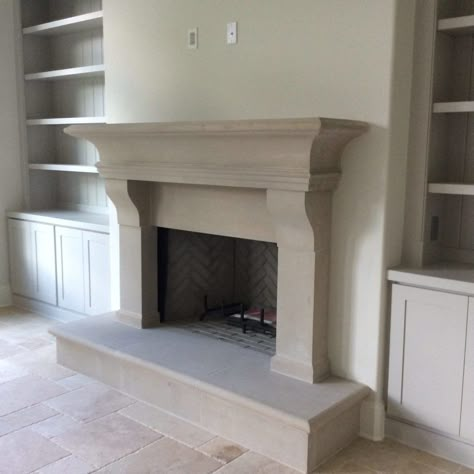 French Country Fireplace With Built Ins, Fireplace Cast Stone, Fireplace With Raised Hearth Ideas, Stone Cast Fireplace, Raised Fireplace Hearth, Raised Hearth, Italian Fireplace, Fireplace Farmhouse, Limestone Fireplace Surround