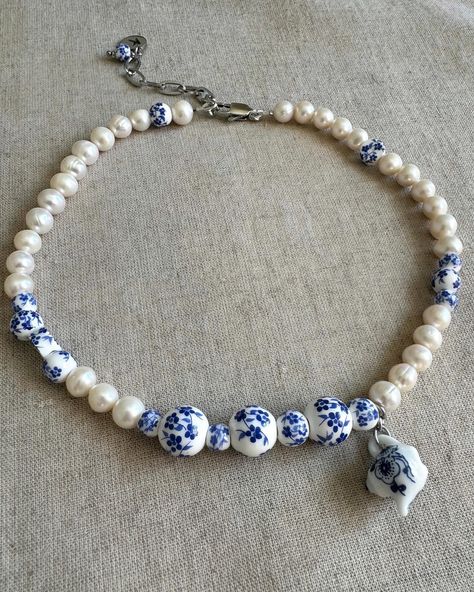 Handmade necklace with a stunning combination of blue and white porcelain beads and freshwater pearls, reminiscent of the elegance found in classic Chinese ceramics💙💙 Collier de perles d’eau douce et perles bleues de Delft en céramique. Délicatement fabriqué à la main💙🤍 Blue And White Necklace, Blue Pearl Necklace, Jewelry Embroidery, Ceramic Beads Necklace, Porcelain Necklace, Porcelain Beads, Blue And, Chinese Jewelry, Blue Beaded Necklace