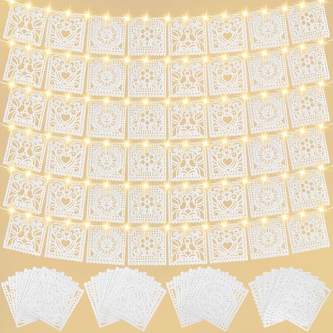 PRICES MAY VARY. Felt Authentic Mexican Design: our product includes 6 pieces of White Papel Picado banners and 6 pieces of 3 meters LED Fairy String Lights, each white Mexican banner pack includes 12 panels with 4 pattern designs per banner, providing a vibrant and festive atmosphere; Add a touch of Mexico to your parties and wedding celebrations with these white Papel Picado banners Generous Size: each White Papel Picado banner measures approximately 9.8 ft/ 3 meters in length, offering a tota White Mexican Theme Party, Mexican Christmas Party, Elegant Mexican Theme Party, Rancho Wedding Mexican, Mexican Wedding Aesthetic, Mexican Wedding Theme, Mexican Wedding Centerpieces, White Papel Picado, Mexican Store