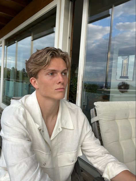 Blonde boy with middle part chilling on the balcony Male Short Middle Part, Men Hairstyles Middle Part, Hair With Middle Part, Old Money Middle Part Hair Men, Blonde Man Hairstyle, Men’s Short Middle Part, Blond Mens Haircut, Mens Short Middle Part, Men Blonde Hairstyles