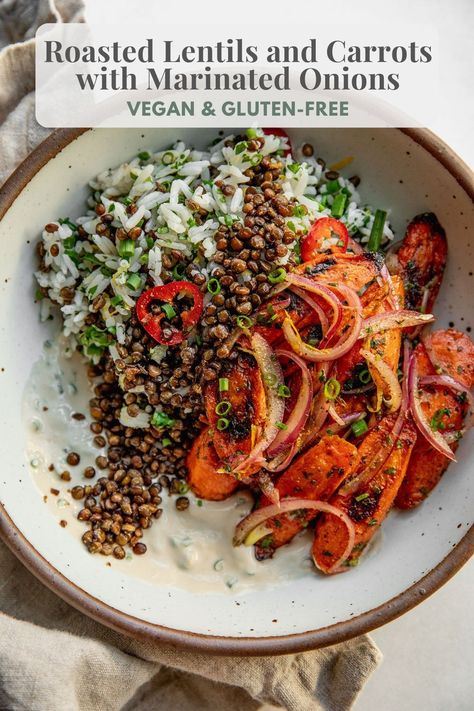 This bowl of roasted lentils and carrots are served with marinated onions and a smear of creamy garlic chive tahini sauce. Great to meal prep for meals through the week. Lentil Bowls, Lentil Bowl, Marinated Onions, Roasted Lentils, French Lentils, Garlic Chives, Lentil Recipes, Tahini Sauce, Roasted Chickpeas