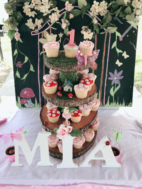 Fairy Tales Birthday Party Theme, Fairy Tail First Birthday Party, Food For Fairy Birthday Party, Fairy Garden Smash Cake, Fairy First Birthday Party Diy, Fairy Birthday Smash Cake, Fairy First Centerpieces, Fairy First Cupcakes, Fairy Tale First Birthday Party