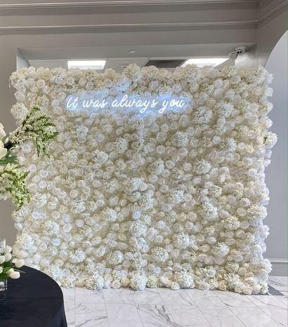 Flower Wall Sizes, White Flower Photo Wall, White Bridal Shower Photo Backdrop, Wall Covering Wedding, White Rose Backdrop Floral Wall, Engagement Party Flower Wall, White Floral Wall Wedding, Floral Wall Backdrop Wedding, White Rose Wall Wedding