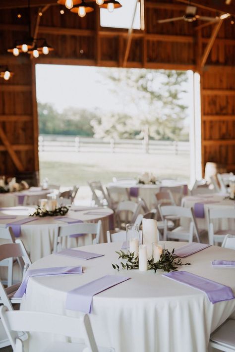 Green and purple wedding decor, sage green wedding aesthetic, light purple wedding table settings, pastel wedding theme, lavender wedding ideas, sage purple and gold wedding theme, dusty green and purple event theme, purple wedding palette, purple rustic wedding, elegant barn wedding, lilac and sage green table settings, sage green bridesmaids dresses, rustic lavender centerpieces, bourbon barrel cake stand, purple and greenery Green And Lavender Centerpieces, Lavender Table Centerpieces, Sage Green And Purple Wedding Centerpieces, Sage And Lavender Centerpieces, Wisteria And Sage Wedding, Lilac Purple And Sage Green Wedding, Lavender Sage And Cream Wedding, Light Purple Wedding Decor, Dusty Purple Wedding Theme